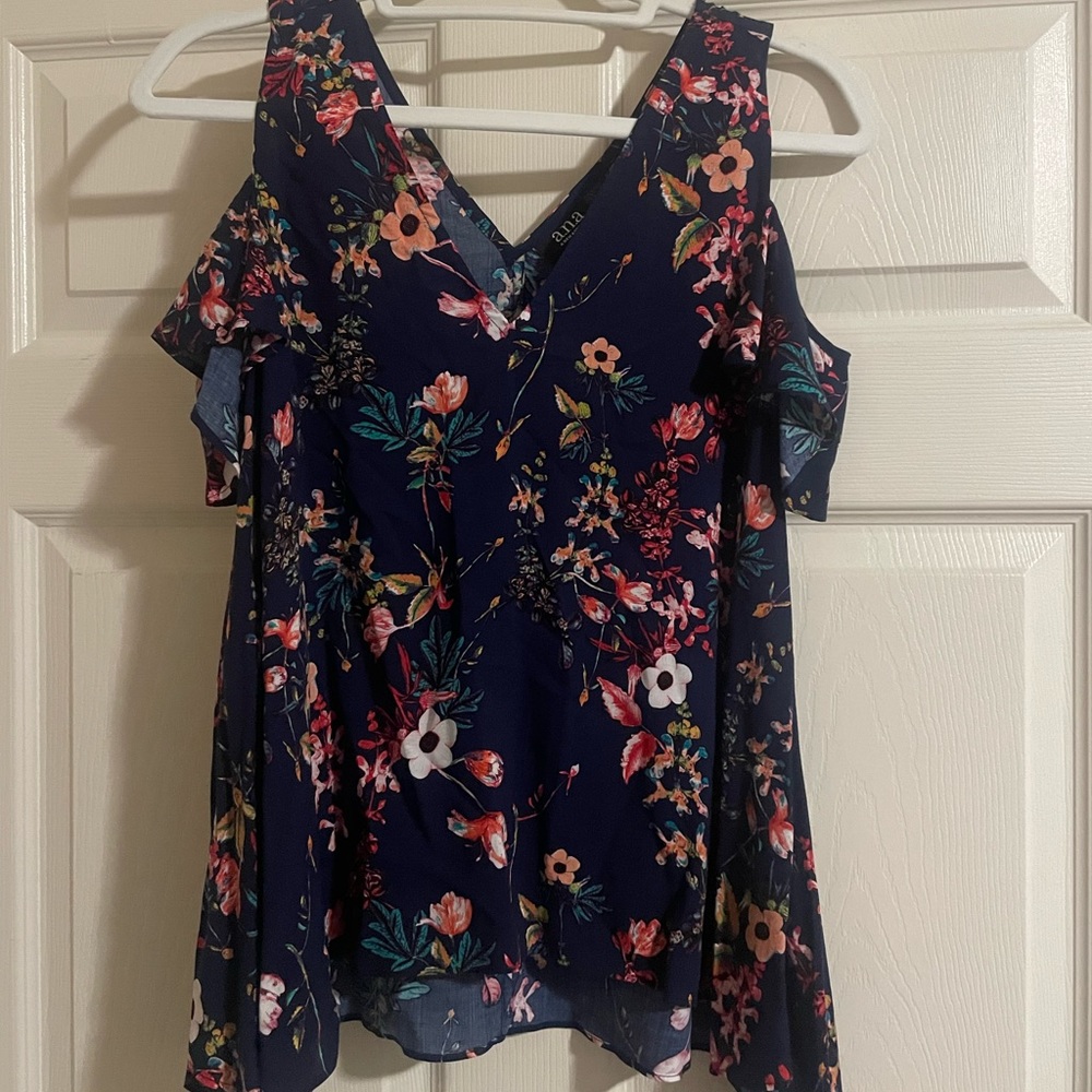 Navy blue floral blouse. Asymmetrical bottom cut. Cute sleeves.